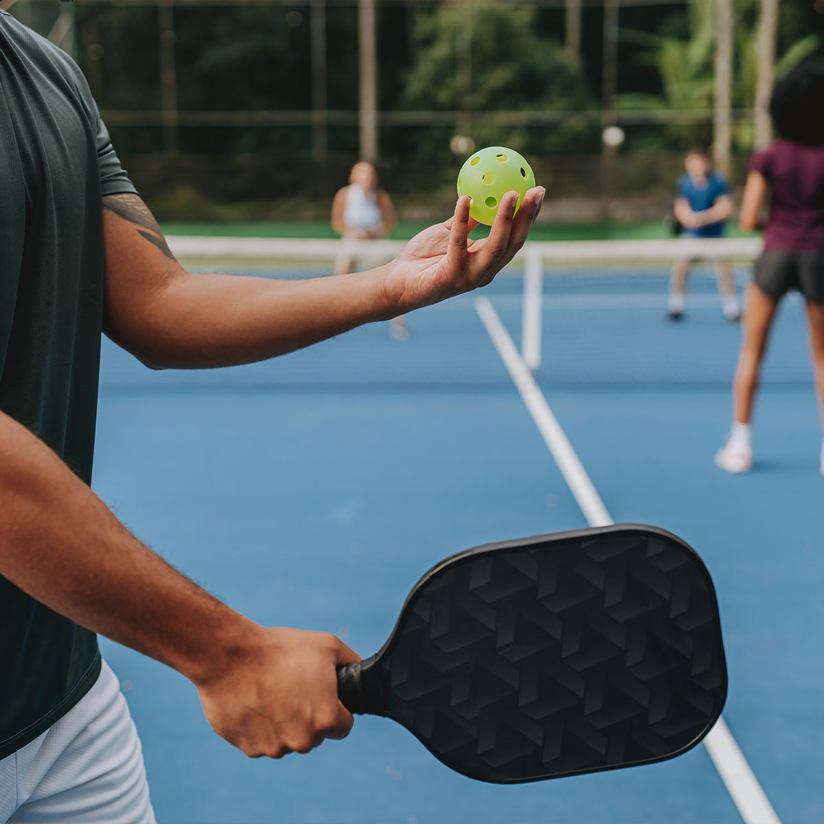 People playing pickleball